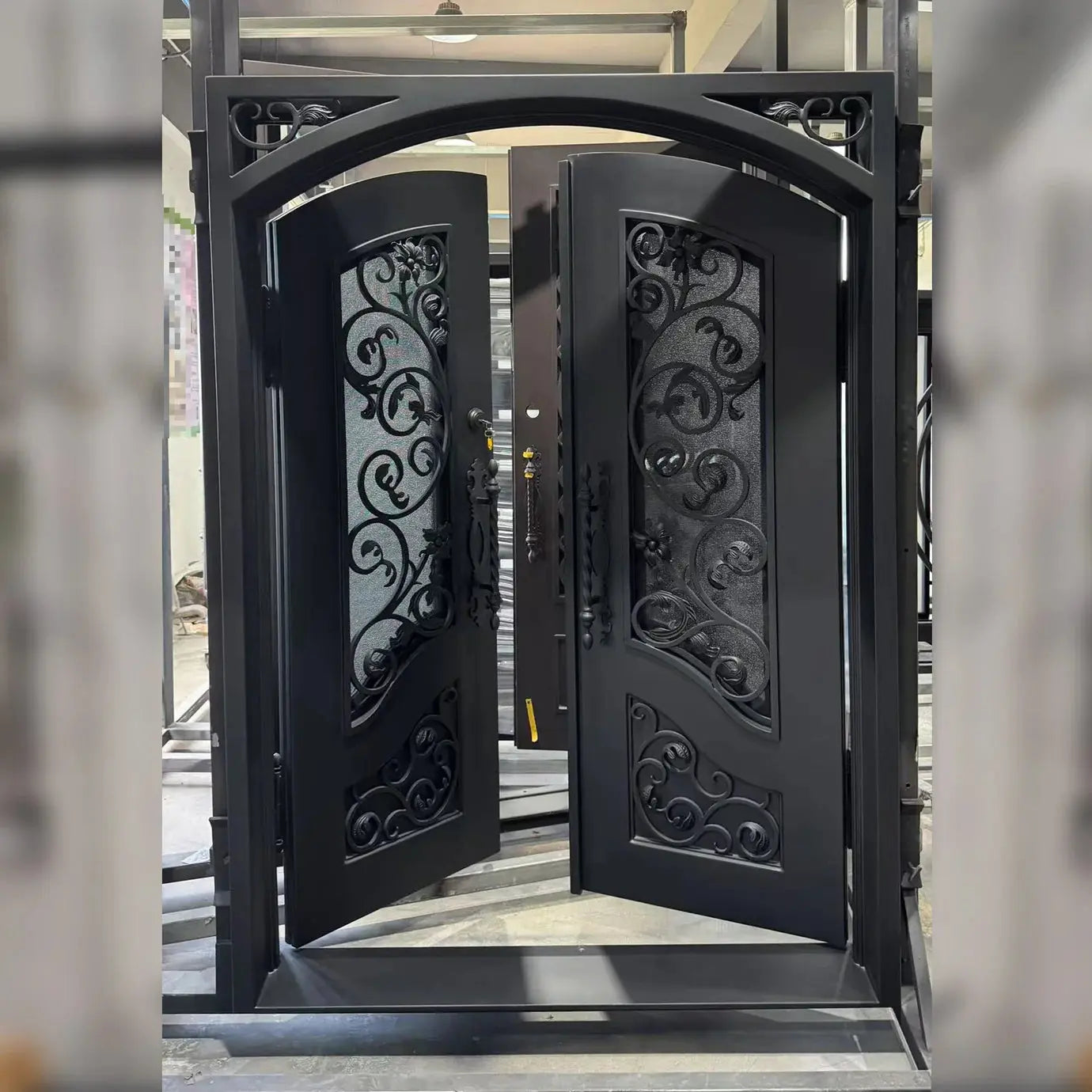 Elegant Wrought Iron Double Entry Door with Decorative Rain Glass Veteranshops.com